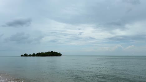 malacca strait in malaysia port dickson calm ocean sea water, cloudy sky