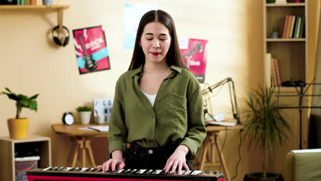 girl playing music at home