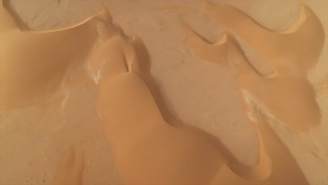 sand dunes in el agunia, morocco, africa, nature, background. aerial top-down pov