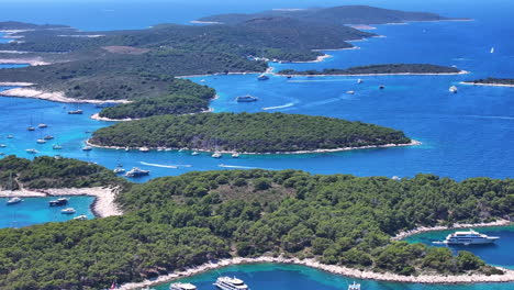 4k aerial footage of croatia's hvar island, captured with a mavic pro 3. experience breathtaking views of crystal-clear waters, luxurious yachts, and picturesque islands in this tropical paradise.