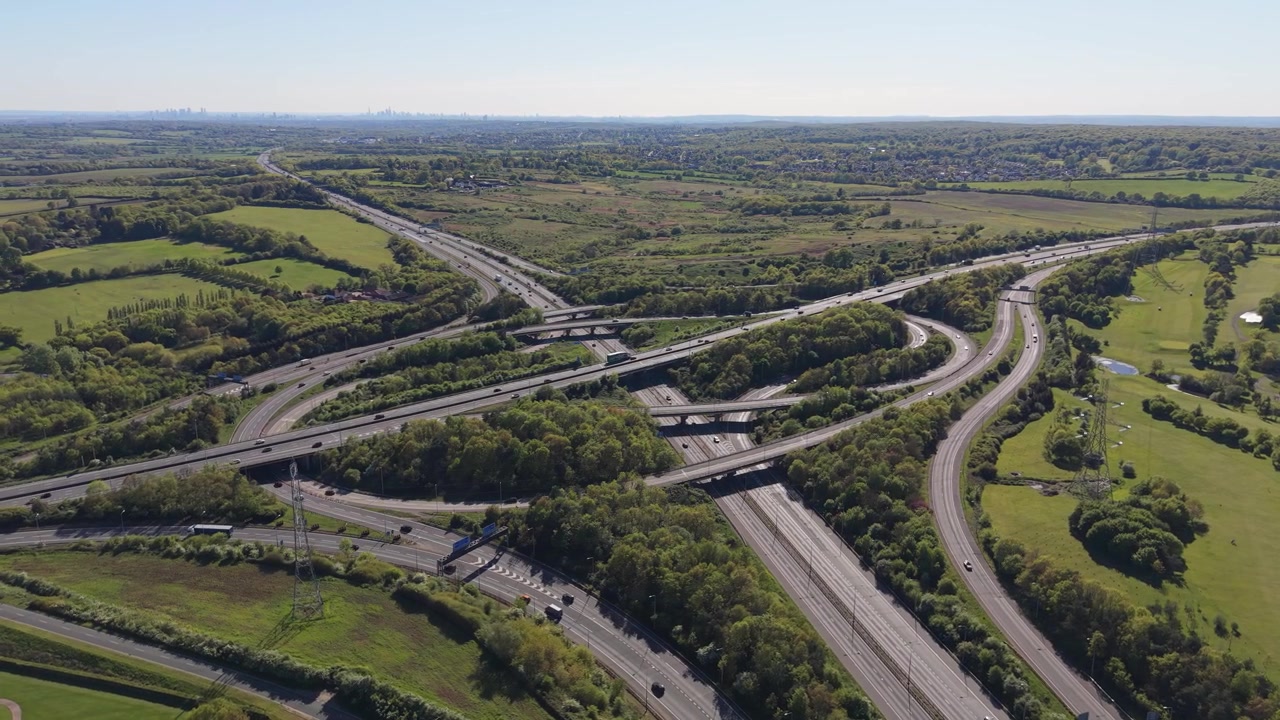 Complex Rural Highway Interchange With Cars Driving on a Sunny Day