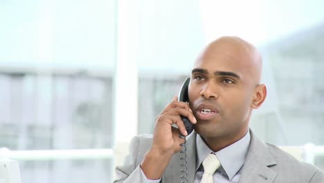 confident businessman on phone