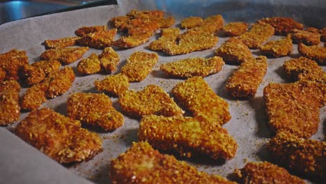 Freshly-baked-chicken-nuggets-on-parchment-paper