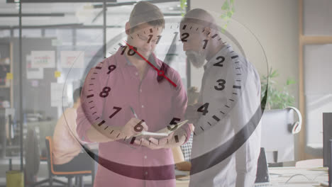 animation of ticking clock against two diverse men discussing over a diary at office