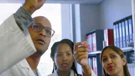 team of scientist discussing with each other 4k