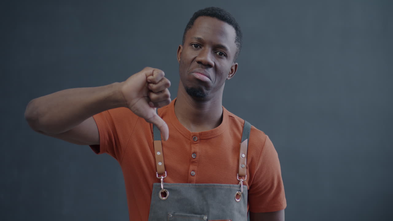 Man giving thumbs down