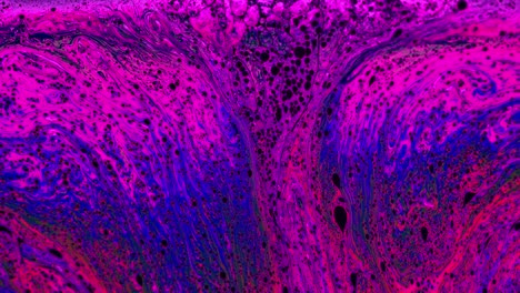 tiny bubbles from soap surface with colorful streaks