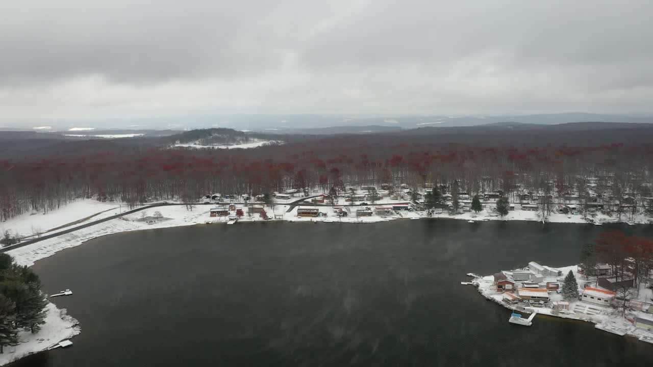 Foggy Winter Lake in Snowy Woods - Drone Countryside Footage