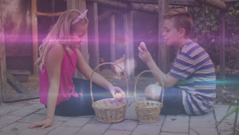 pink and blue light trails against caucasian brother and sister holding eggs in the farm