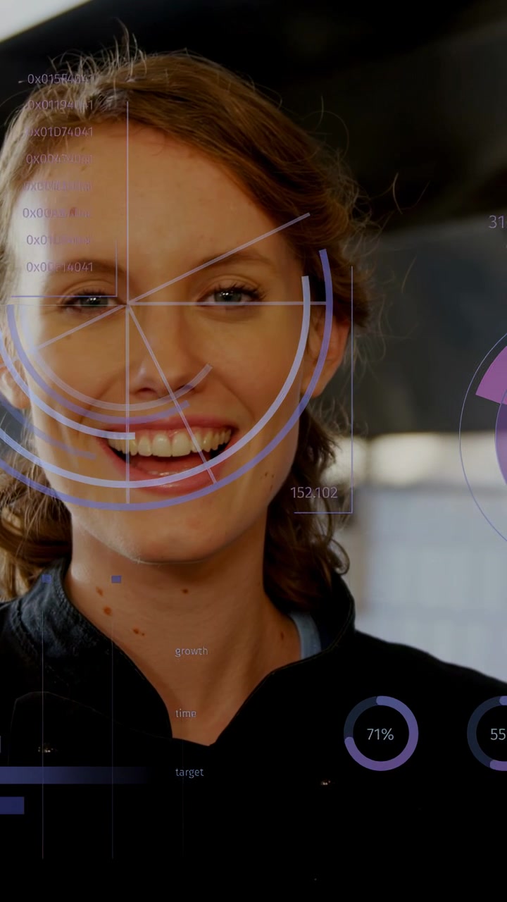 Vertical video: Chef laughing on camera reveal in kitchen HUD rings rotating over face showing data