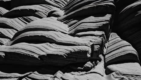abstract black and white wavy sandstone rock formations