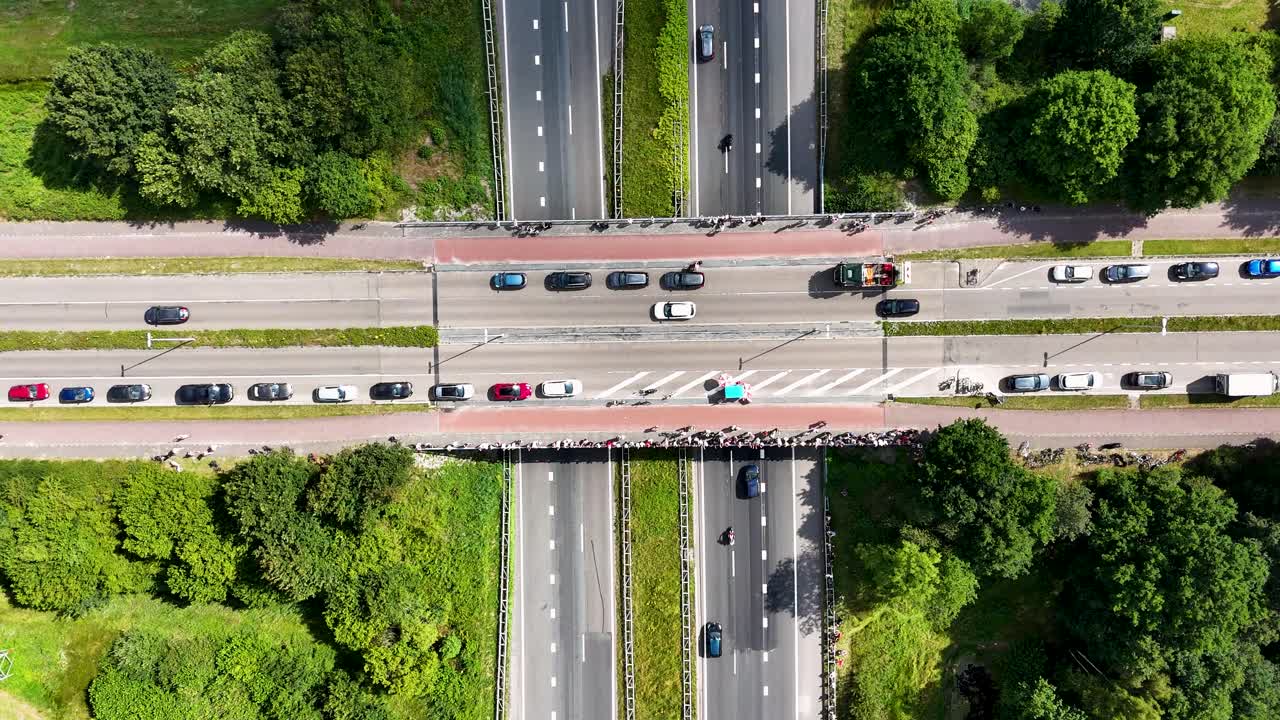 Aerial View of Highway Intersection with Pedestrians