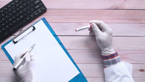 medical professional working with blood sample