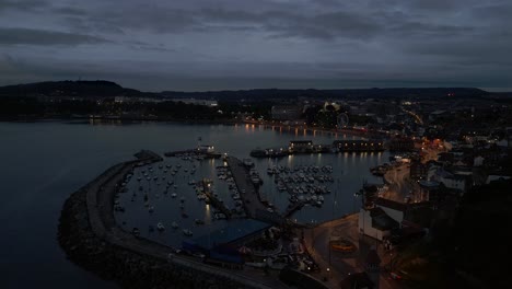 Establishing-Night-Drone-Shot-Over-Scarborough-Harbour-and-Town