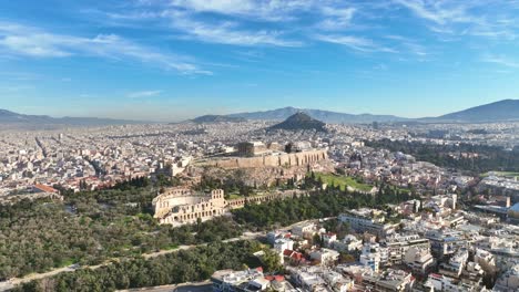 taking off with a view of the acropolis in the city of athens, greece
