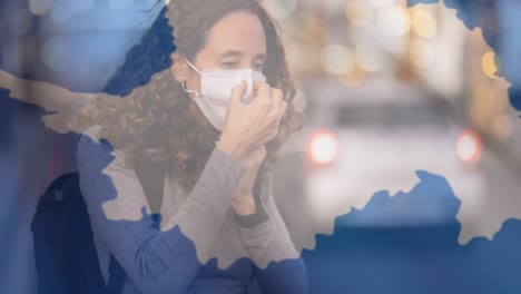 Antarctica-flag-waving-against-woman-wearing-face-mask