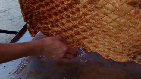 Mexican-chicharron-being-made-on-a-table