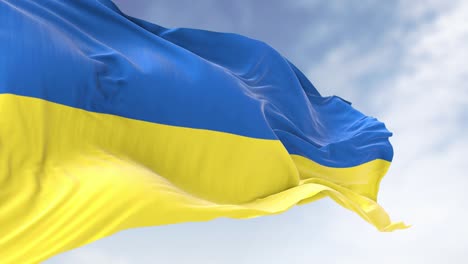 detail of the national flag of ukraine waving in the wind on a clear day