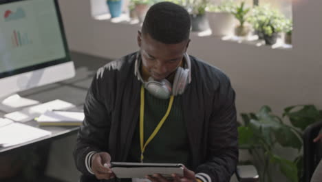 young-business-people-meeting-african-american-team-leader-woman-using-tablet-computer-showing-creative-project-ideas-on-screen-sharing-strategy-colleagues-collaborating-in-office-briefing