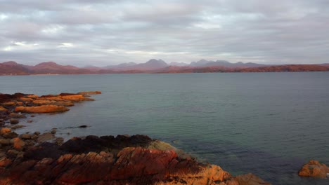 sunset panorama with a rugged coastline - gairloch scotland