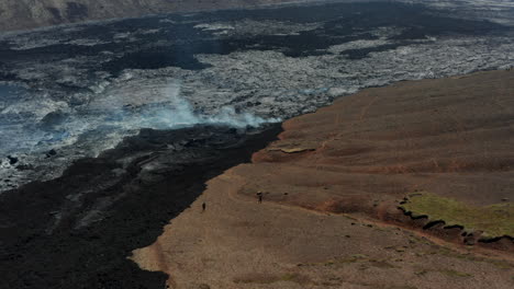 Aerial-panoramic-view-of-huge-lava-field.-Mass-of-material-erupted-from-volcano.-Fagradalsfjall-volcano.-Iceland,-2021