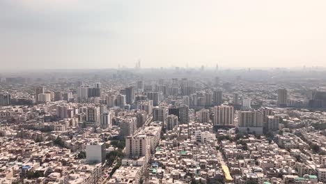 aerial backward drone view of buildings in the karachi city