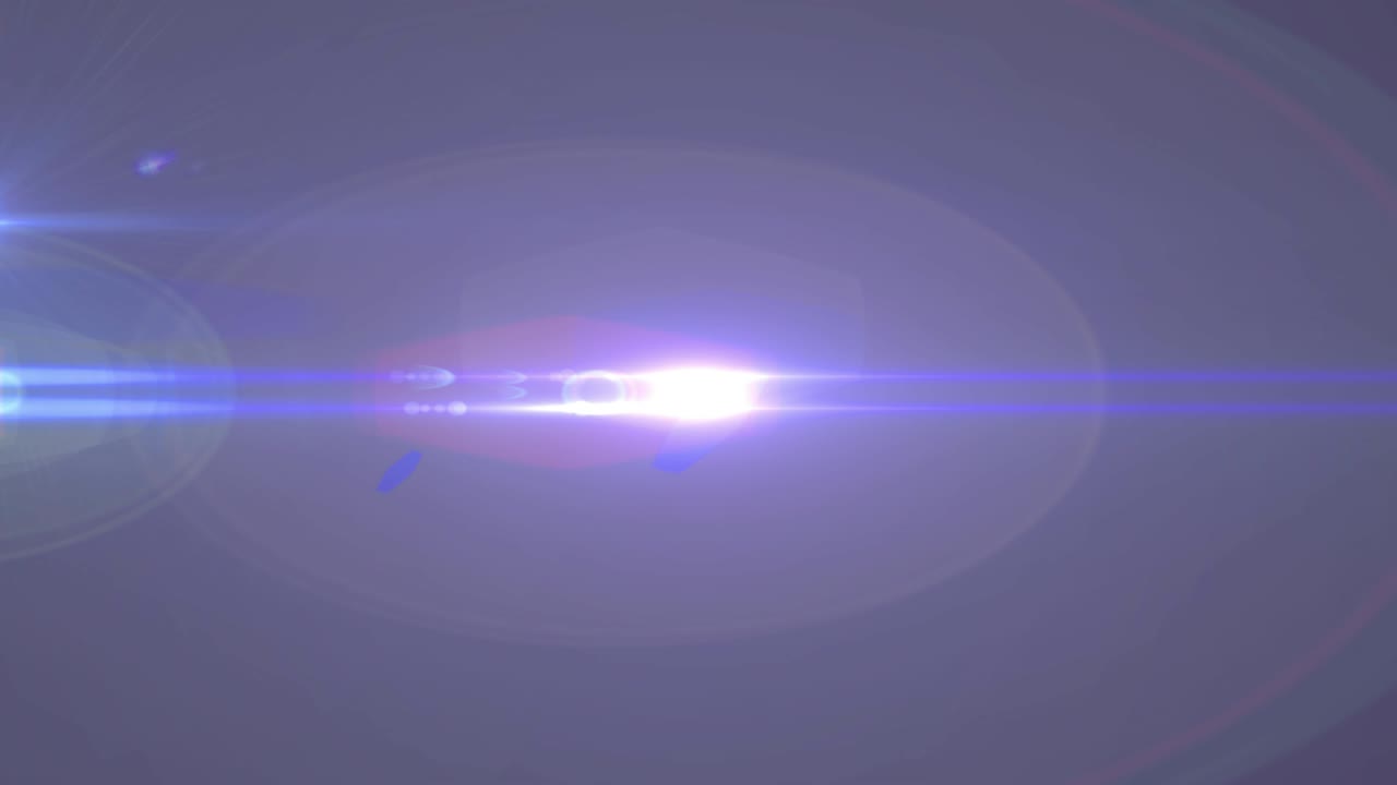 animación del foco con destello de la lente y haces de luz que se mueven sobre un fondo oscuro