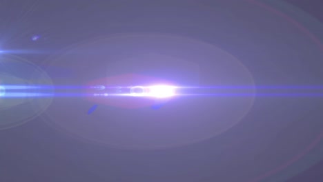 animación del foco con destello de la lente y haces de luz que se mueven sobre un fondo oscuro