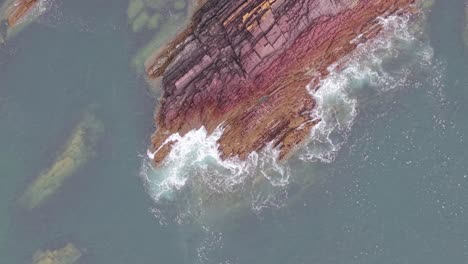 waves crash on rocky irish coast creating a dramatic scene of nature's power