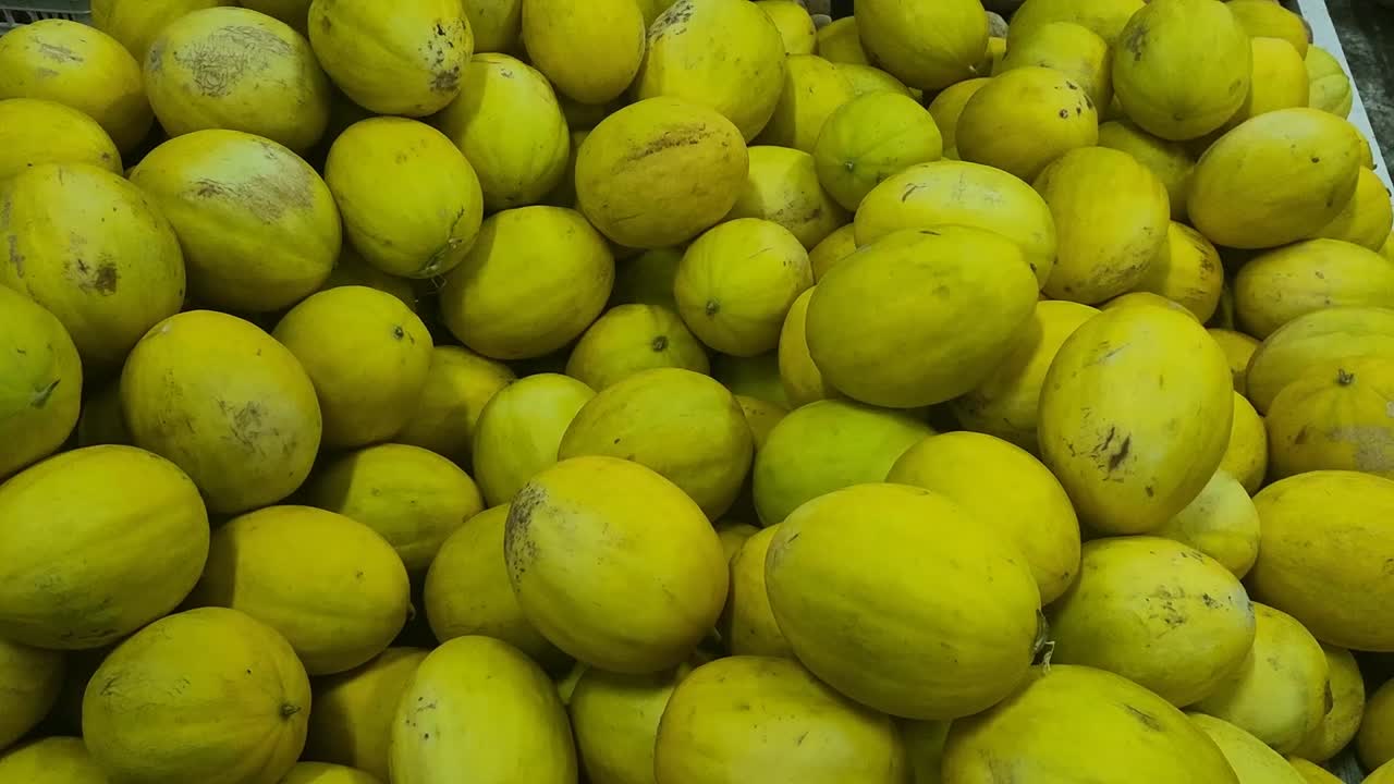 Yellow melon, also known as canary melon, is a sweet, juicy fruit with a bright yellow skin and smooth flesh. It has a refreshing taste, often likened to a mix of honeydew and cucumber.