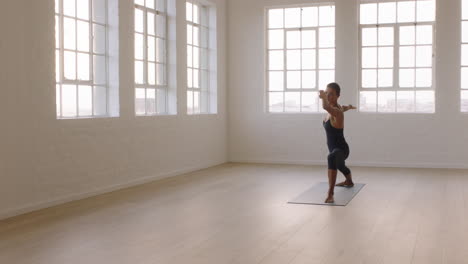 beautiful yoga woman practicing extended side angle pose enjoying fitness lifestyle exercising in studio stretching flexible body training early morning meditation on exercise mat