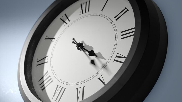 Latin Clock Face on Light Blue Wall in Time Lapse