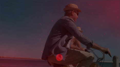 riding bicycle, man wearing hat in animation with red light effects in background
