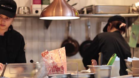 chef working in a busy kitchen environment