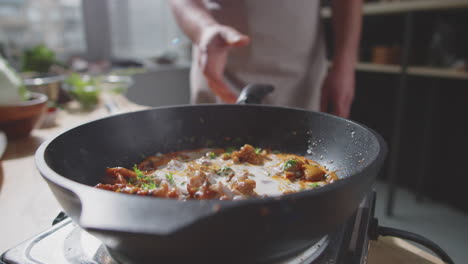 cooking chicken with creamy sauce