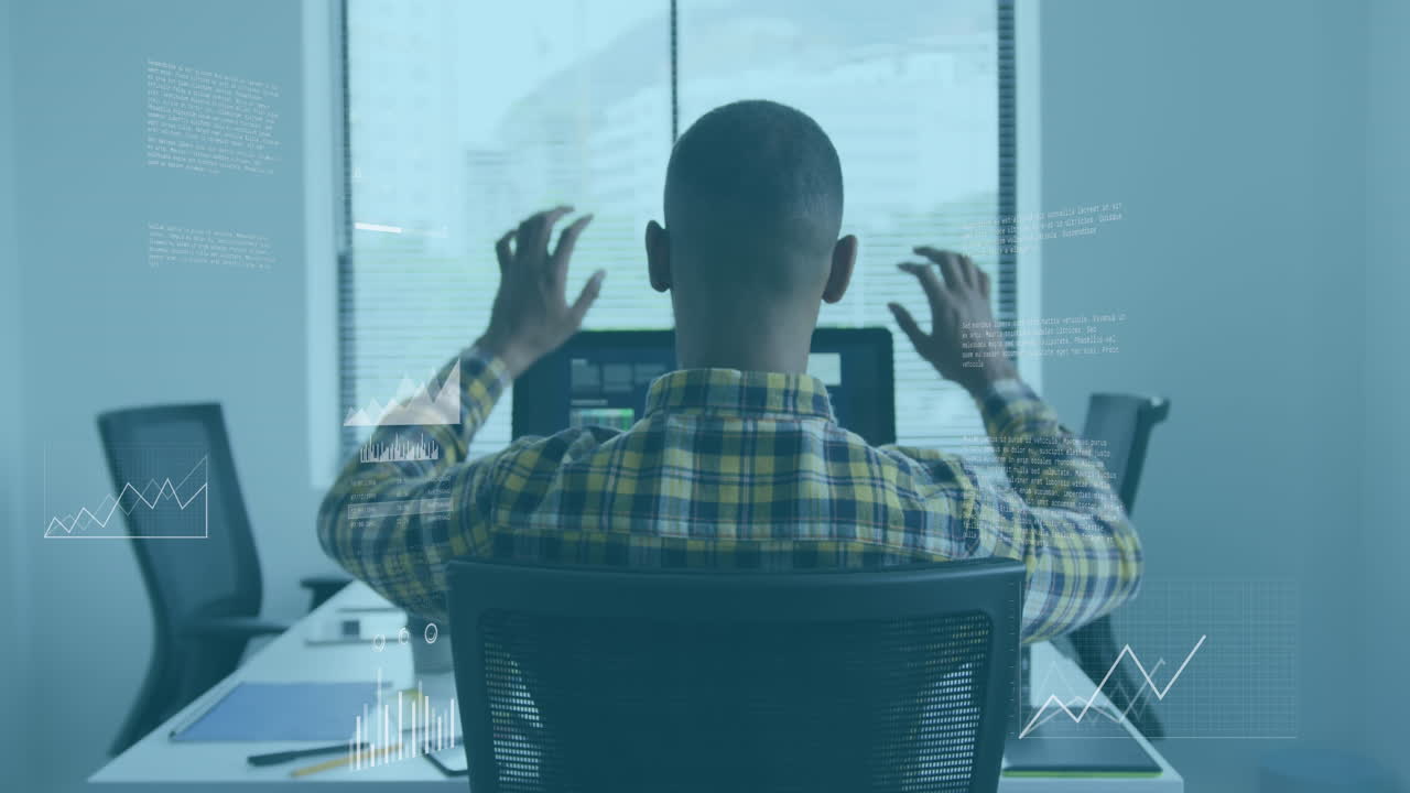 Animation of graphs, map, rear view of biracial programmer relaxing after completing coding