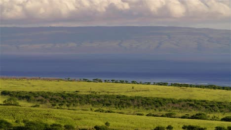 Sunset-behind-green-fields-on-the-Hawaiian-island-of-Molokai-1