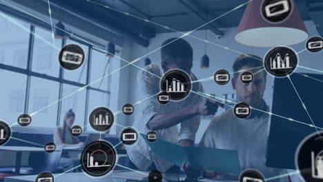 animation of network of connections with graph icons over diverse business people in office