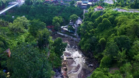 Tegenungan-Waterfall-And-Blangsingah-Glass-Bridge-With-Bar-And-Restaurant-In-Bali,-Indonesia