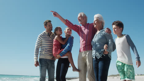 family enjoying free time on the beach together