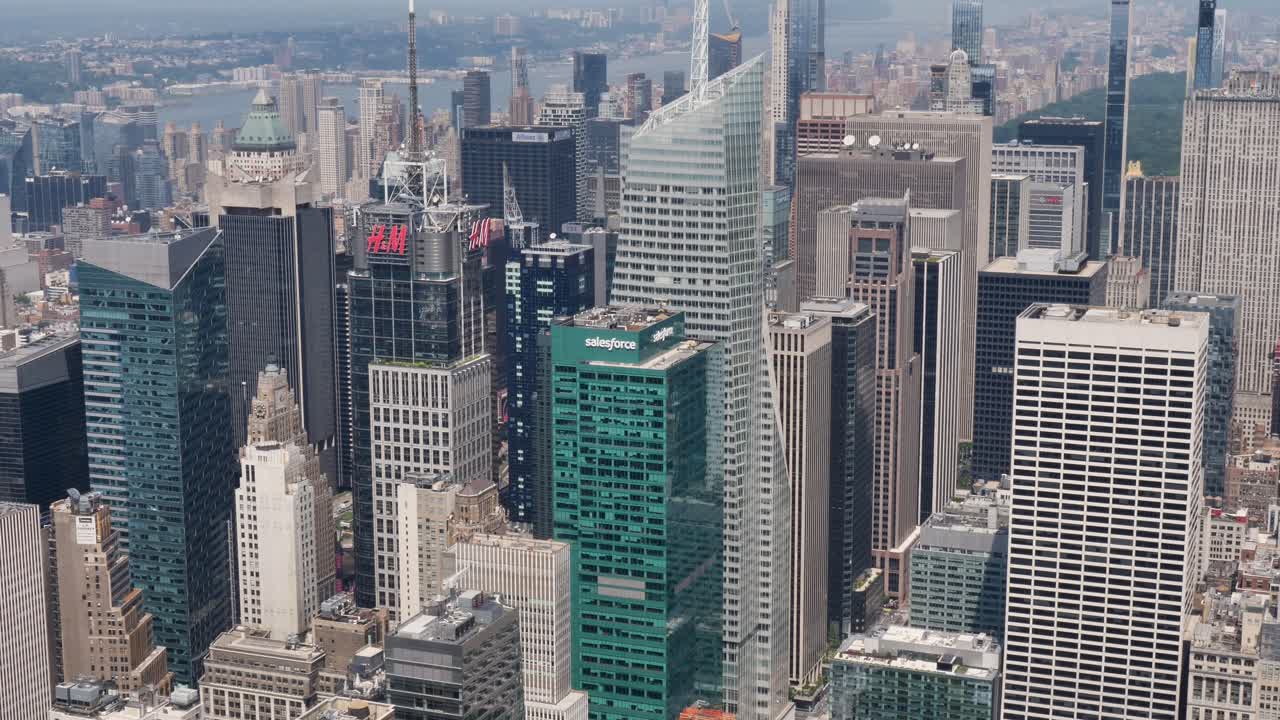 Slow motion landscape of city skyline commercial business skyscrapers urban buildings and towers New York CBD USA America Manhattan Brooklyn Wall Street