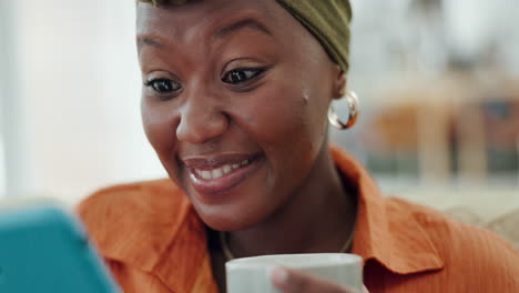 Excited,-black-woman-and-phone-while-drinking-home