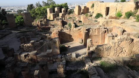 Sunset-light-casting-shadows-on-ancient-Roman-ruins-in-Carthage,-Tunisia,-evoking-history