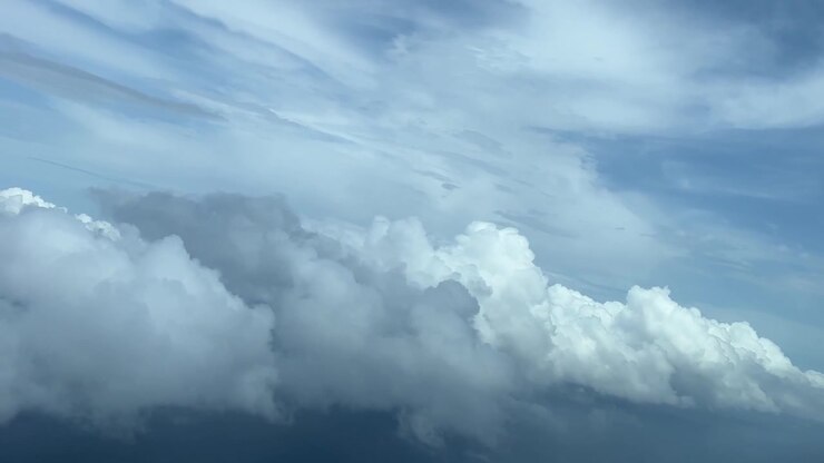 A pilot’s point of view while flying through a stormy sky doing a left turn to avoid bad weather ahead. 8000m high.