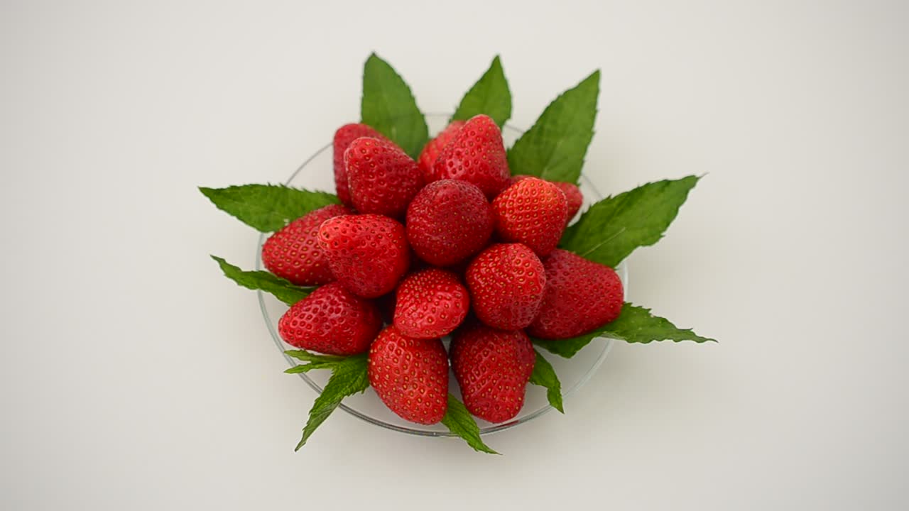 Strawberry on a white background, isolate. Shooting in the movement