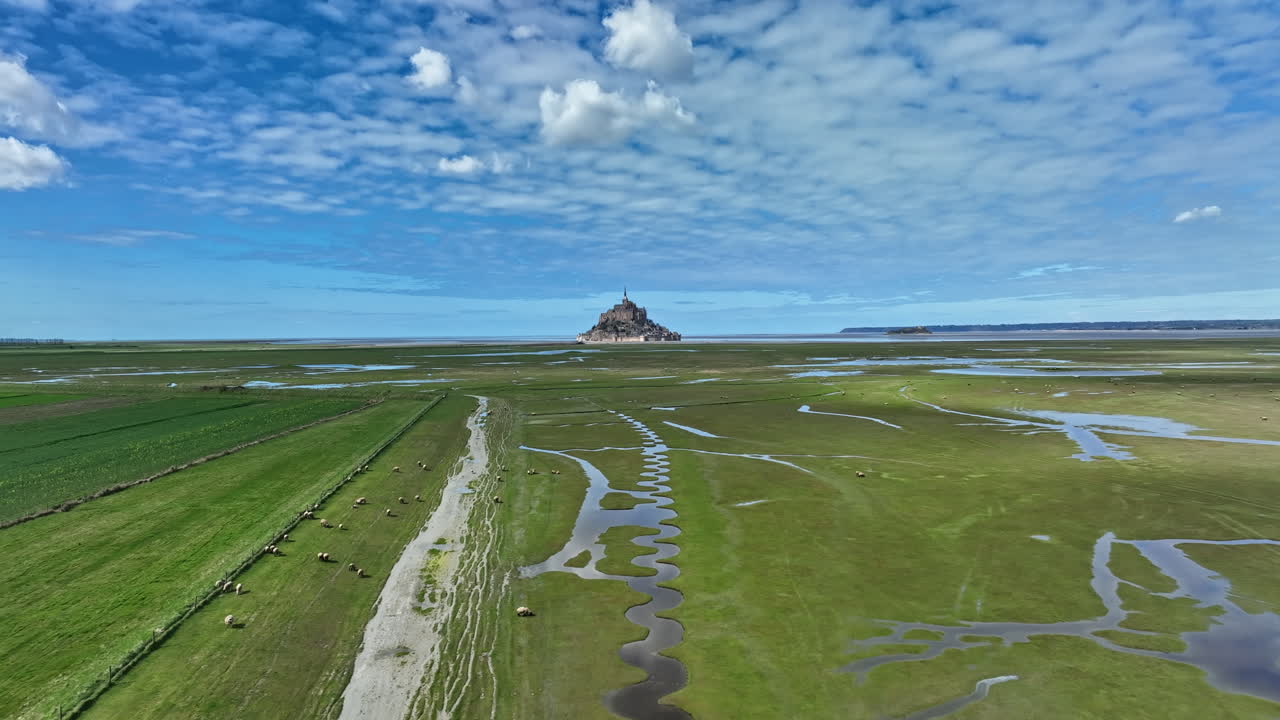 Free stock video - Amidst a tidal bay, mont saint-michel stands as a ...