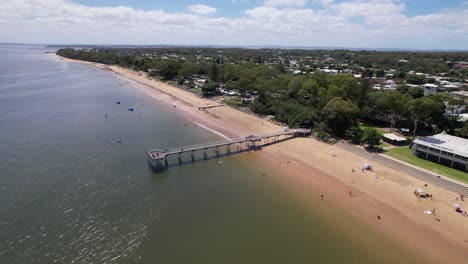 flying over hervey bay, australia’s stunning coastal landscapes in bright midday light
