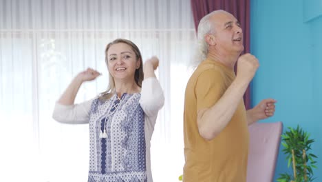 couple dancing in a fun way.