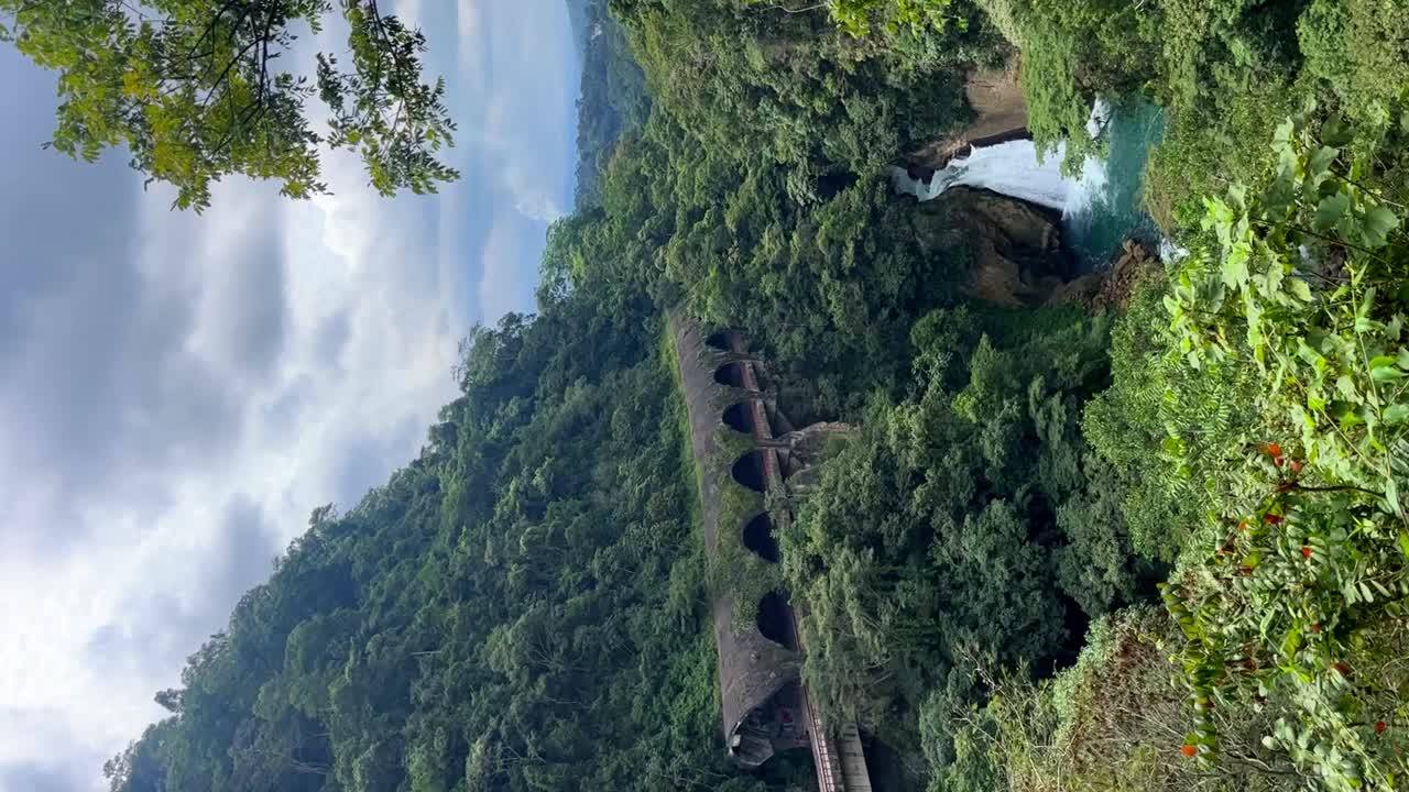 Beautiful postcard of the Pensil Bridge and the Atoyac Waterfall between mountains