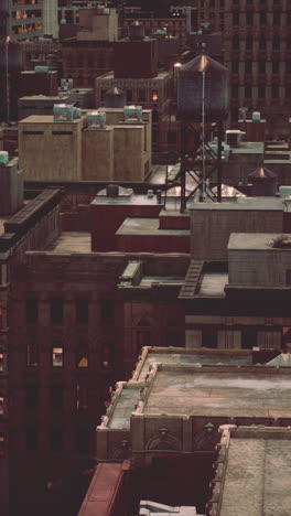 aerial view of city rooftops at dusk